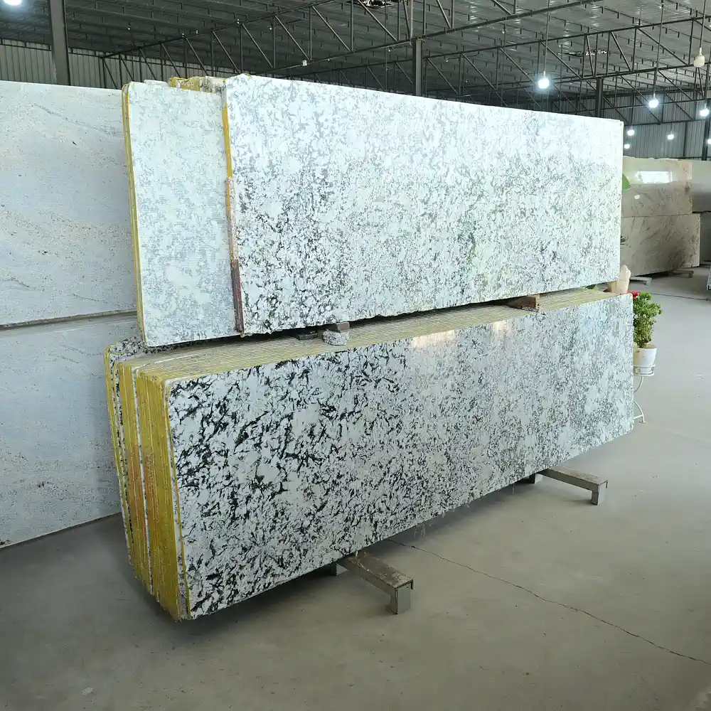 Imperial Alaska White Granite slabs displayed at GL Stone Expo
