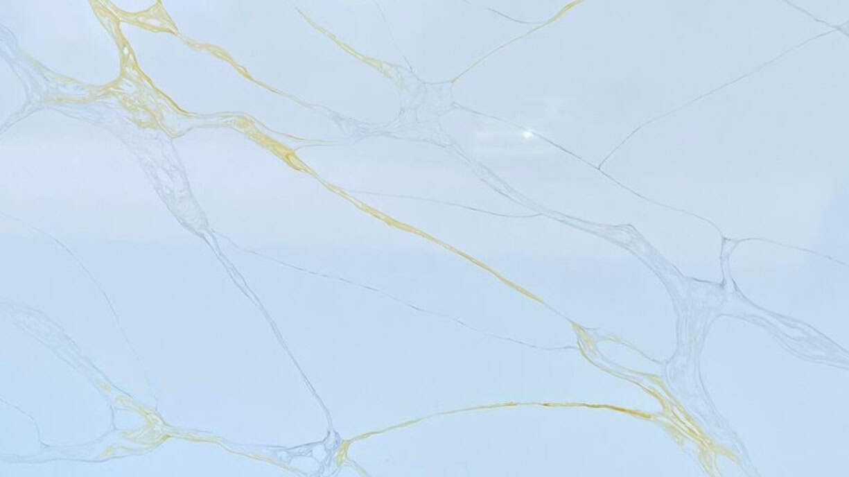 Royal Gold Calacatta Quartz Slab in Tellapur Hyderabad Marble Look Countertop