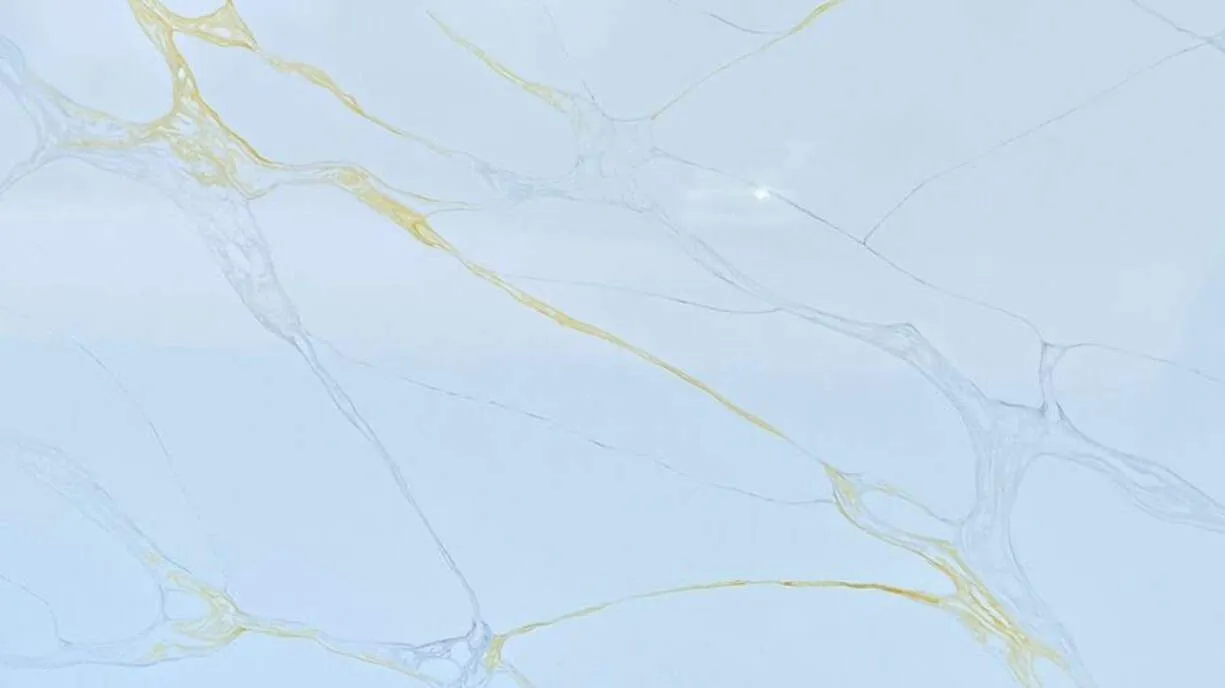 Royal Gold Calacatta Quartz Slab in Tellapur Hyderabad Marble Look Countertop