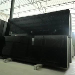 Polished Absolute Black Granite slab for kitchen countertops, flooring, and wall cladding.