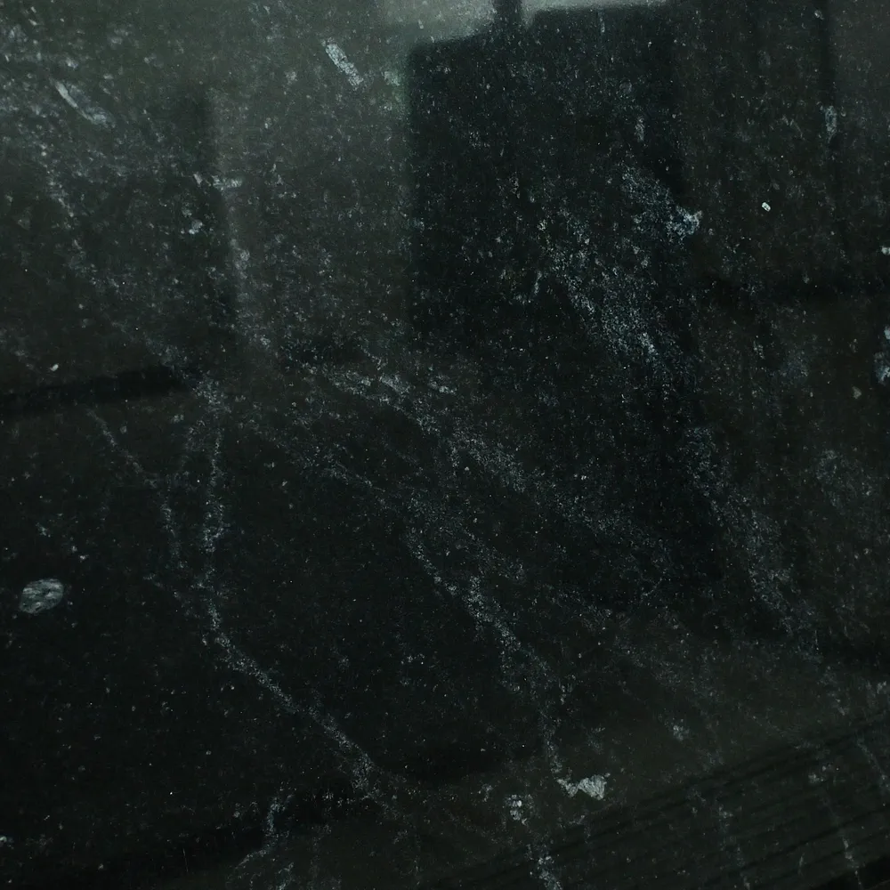 Absolute Black Granite slab display for kitchen countertops, flooring, and wall cladding.