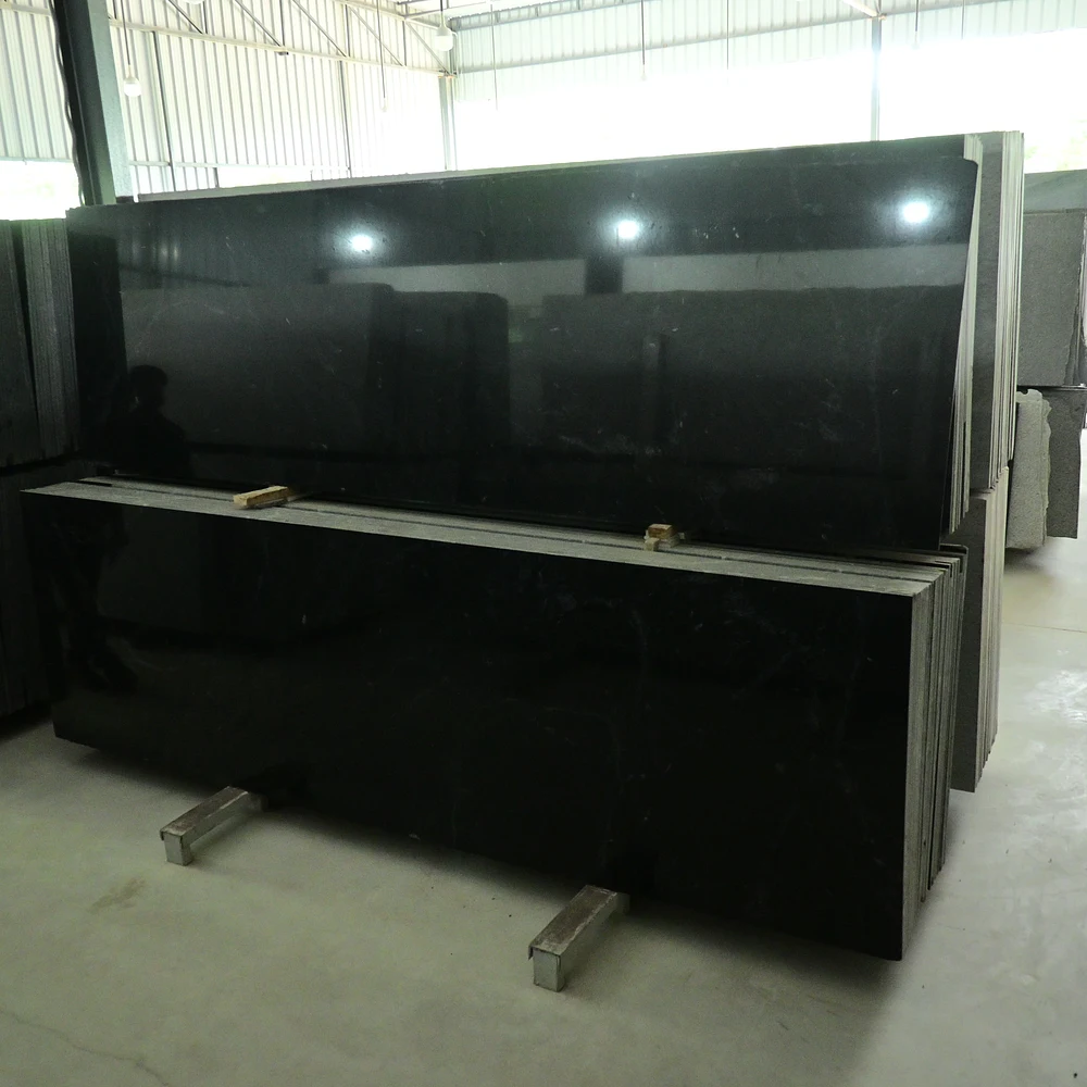 Close-up texture of Absolute Black Granite with a polished natural black surface.