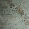 Close-up texture of Alovera Pink Granite with natural pink and black mineral patterns.