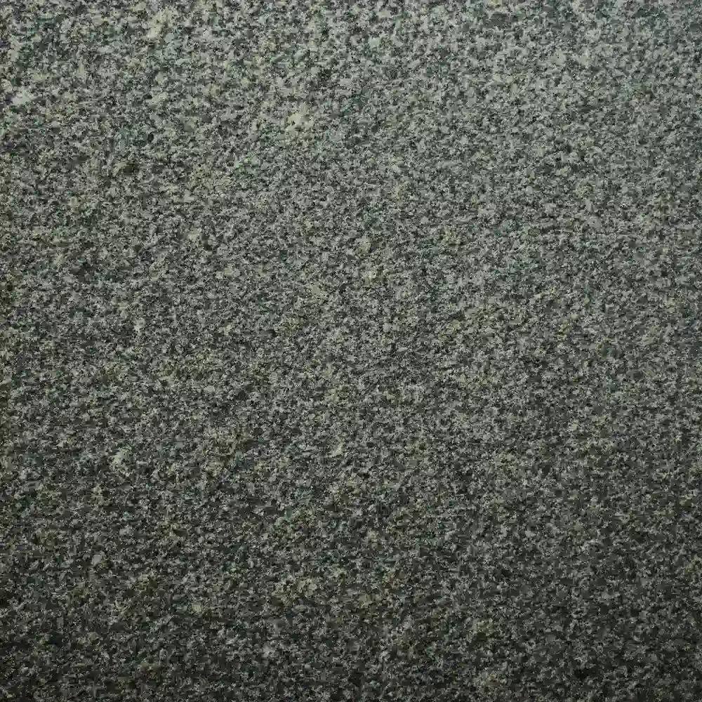 Close-up texture of Chiku Grey Granite natural stone surface