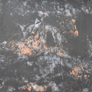 Close-up texture of Clayton Brown glossy vitrified tiles