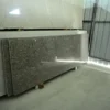 Natural Desert Brown Granite slab with polished finish suitable for kitchen countertops, islands, flooring, feature walls, and commercial interiors.