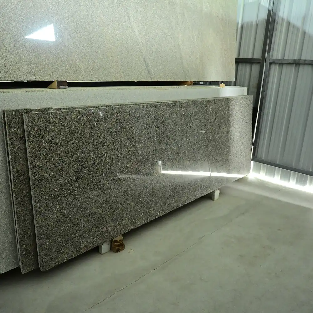 Natural Desert Brown Granite slab with polished finish suitable for kitchen countertops, islands, flooring, feature walls, and commercial interiors.
