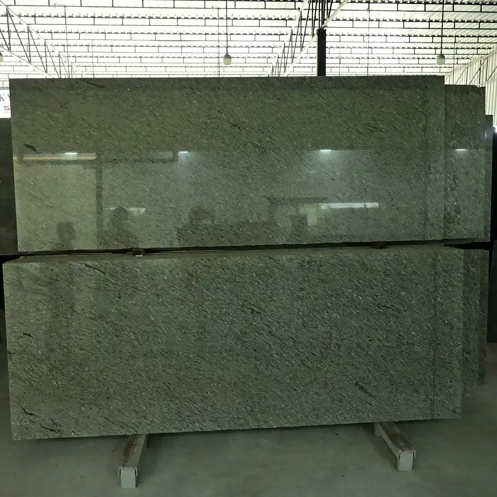 Close-up texture of Diamond Pearl Granite with natural grey mineral patterns.