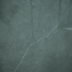 Grigeo Pietra Tile featuring a dark grey-green surface with elegant white veining