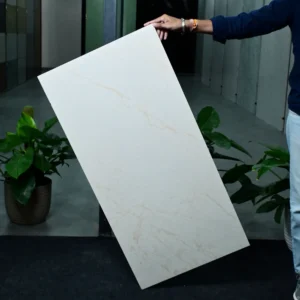 Ivory Pertinax marble look tile slab angled view