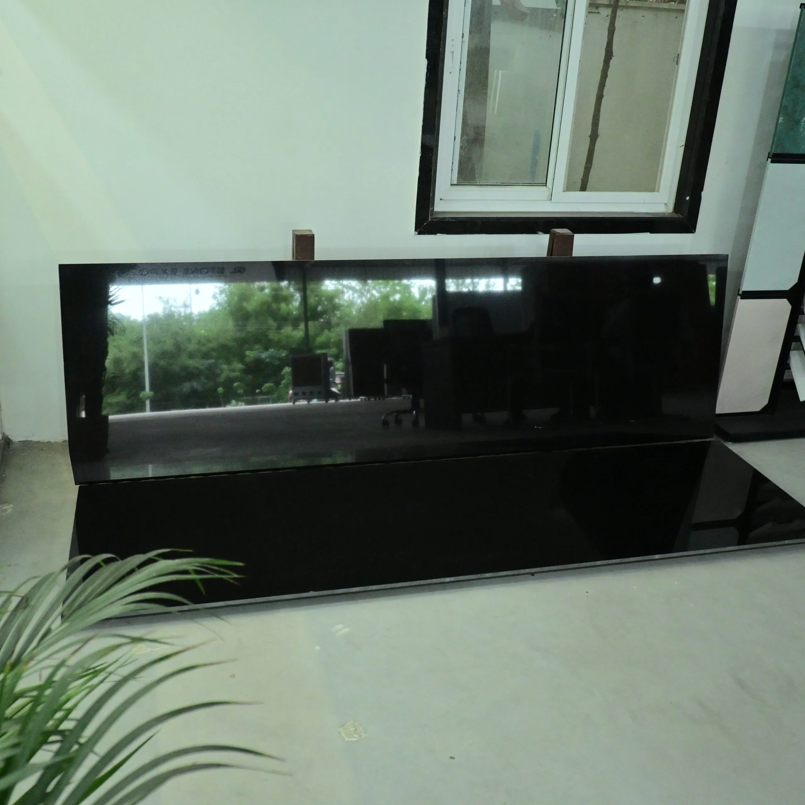 Mirror-finish Black Granite slab for premium residential and commercial interiors.