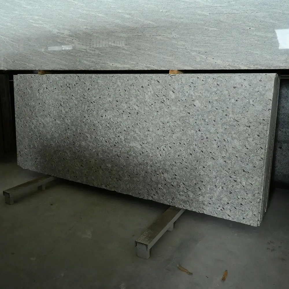 Moon White Granite polished slab in Hyderabad showroom