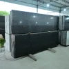 Polished Nova Black Granite slab for countertops, flooring, and wall cladding.