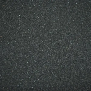 Stella Cocoa Tile featuring a dark cocoa-brown surface with fine grey and light-coloured speckles