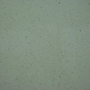 Stella Crema Tile featuring a light cream surface with fine black speckles