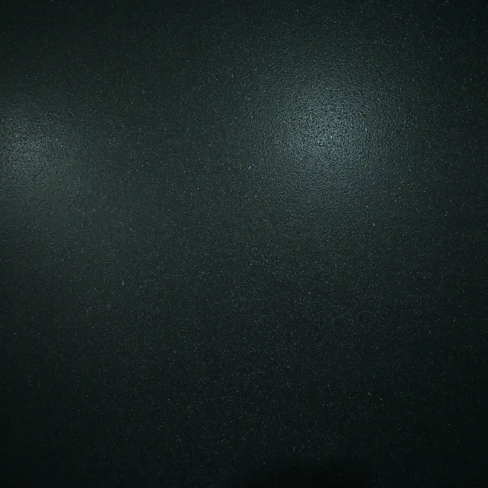 Z Black Leather Granite natural stone slab with a premium leather finish for flooring, kitchen countertops, wall cladding, staircases, and luxury interiors.